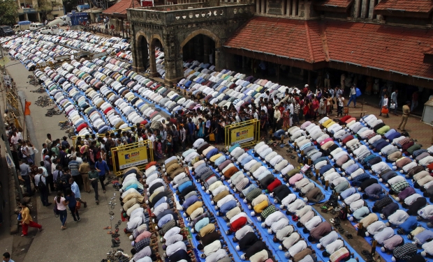 Muslims offer prayers on the last Friday of holy month of Ramadan ahead of Eid ul-Fitr celebrations outside Bandra railway station in Mumbai (Photo: AP) Muslims offer prayers on the last Friday of holy month of Ramadan ahead of Eid ul-Fitr celebrations outside Bandra railway station in Mumbai (Photo: AP)